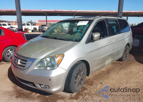 2009 Honda Odyssey Touring z USA, uszkodzony, nr VIN 5FNRL38819B021352